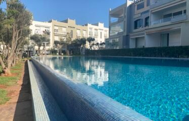 Élégant Appartement Meublé avec Vue Mer à Dar Bouazza – Résidence Sécurisée avec Piscines et Salle de Sport