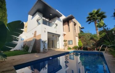 Villa trois chambres avec piscine en résidence sécurisée.